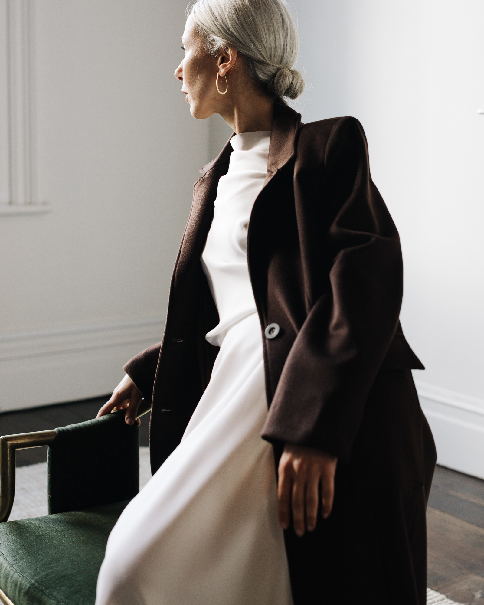 Pilot client_Mina_AW21 Pilot Client Mina, model wears coat in Auckland studio.